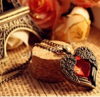 collar corazon con alas